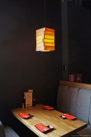 Shabu Shabu Rotterdam pendant book lamp above table in sycamore wood 2.jpg